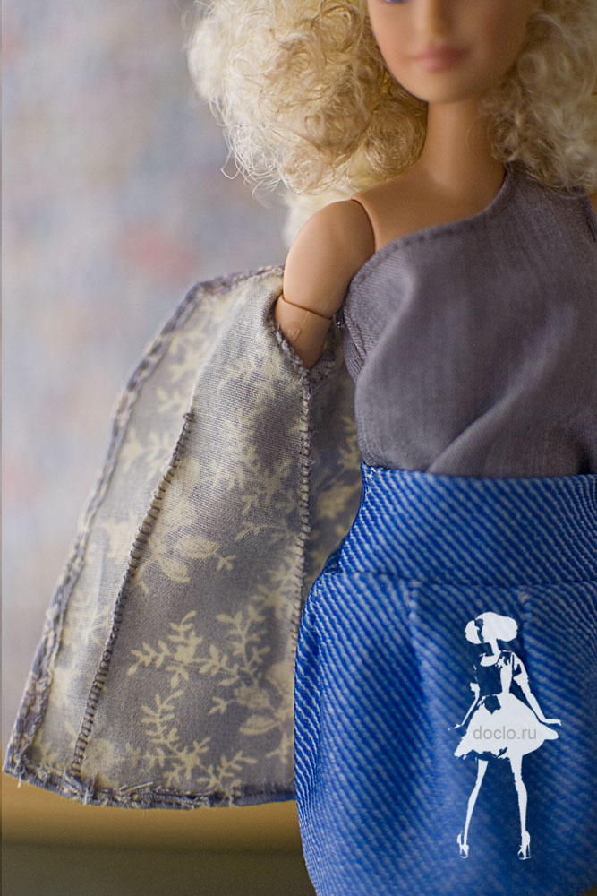 Фотография куклы barbie, увеличенная фотография швов жакета изнутри