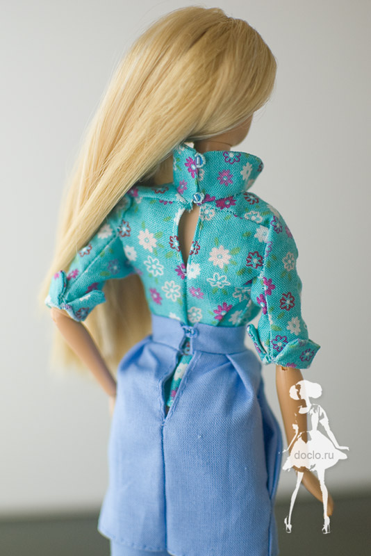 Кукла барби в рубашке реглан, двухслойной юбке, фотография увеличенная со спины
